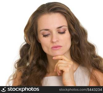 Portrait of thoughtful young woman looking down
