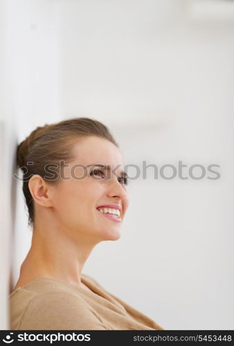 Portrait of thoughtful young woman looking on copy space