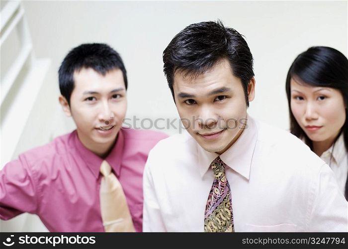 Portrait of three business executives