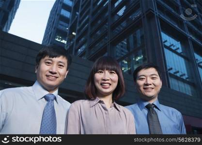 Portrait of three-business people outdoors, Beijing