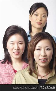 Portrait of three businesswomen smiling