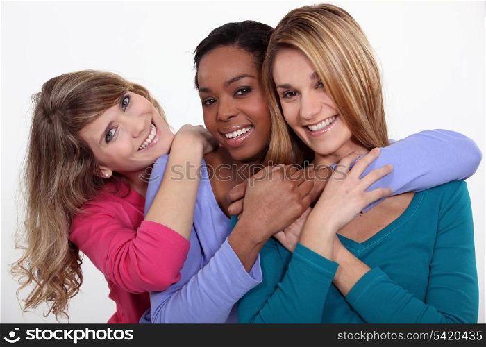 Portrait of three cheerful girls