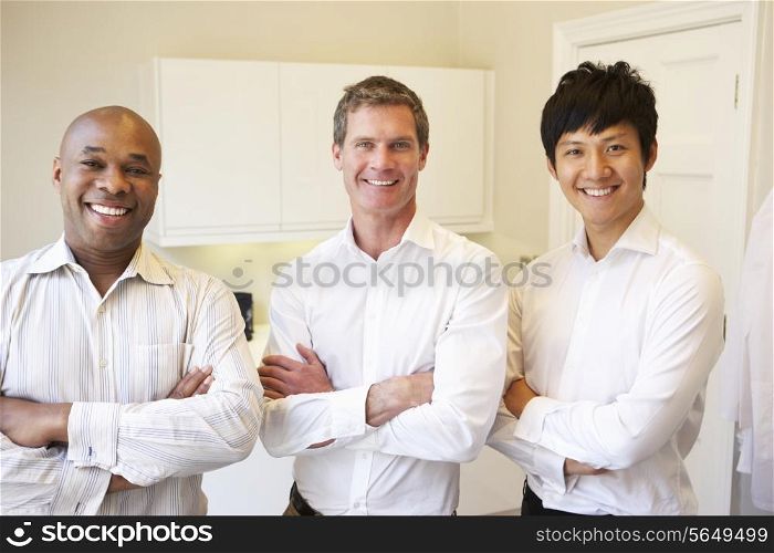 Portrait Of Three Doctors In Hospital