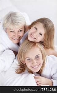 Portrait of three women on a white