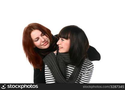 portrait of two beautiful redhead and brunette girls with scarf on white