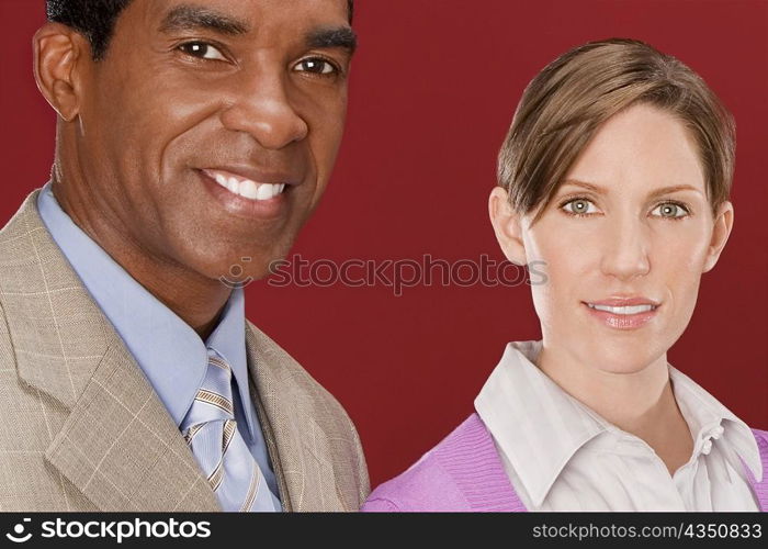 Portrait of two business executives smiling