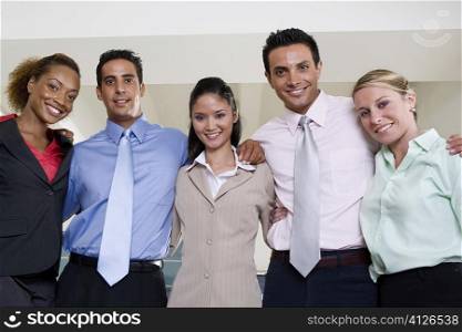 Portrait of two businessmen and three businesswomen smiling