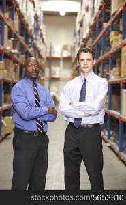 Portrait Of Two Businessmen In Warehouse