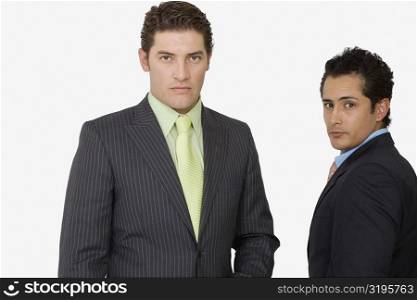 Portrait of two businessmen standing together