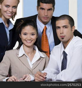 Portrait of two businesswomen and two businessmen in an office