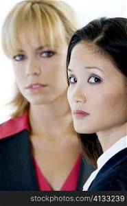 Portrait of two businesswomen looking serious
