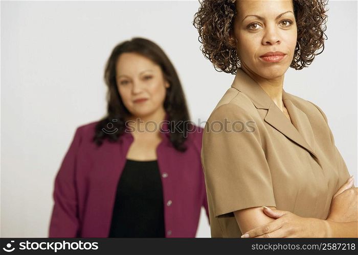 Portrait of two businesswomen standing