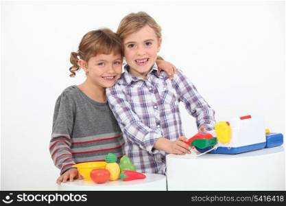 portrait of two children playing