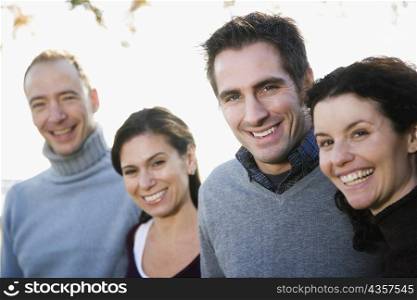 Portrait of two couples smiling