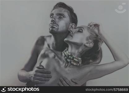 Portrait of Two embracing lovers with silver make-up