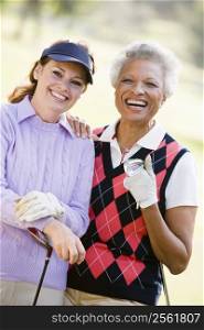 Portrait Of Two Female Golfers