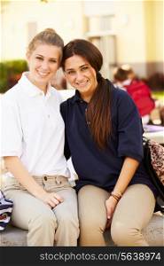Portrait Of Two Female High School Students Wearing Uniform