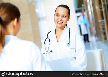 Portrait of two friendly female doctors