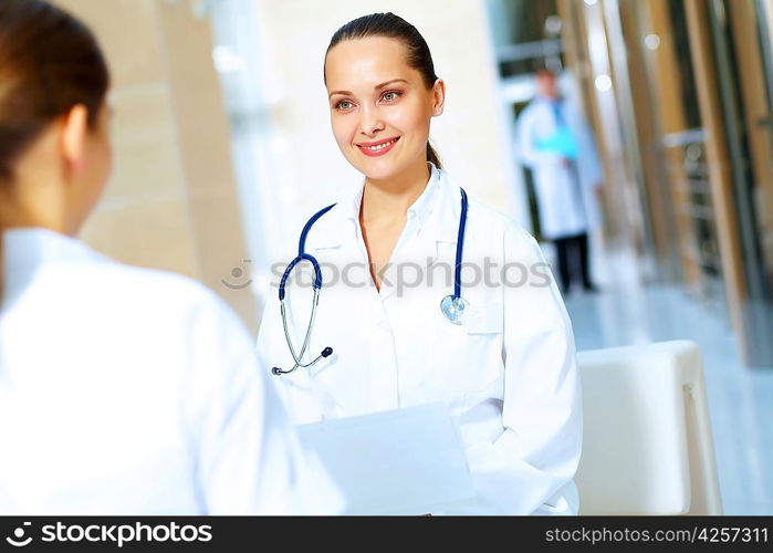 Portrait of two friendly female doctors