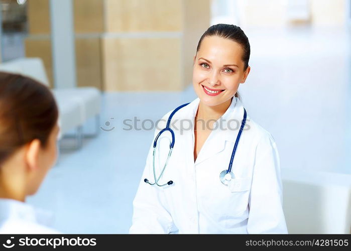 Portrait of two friendly female doctors