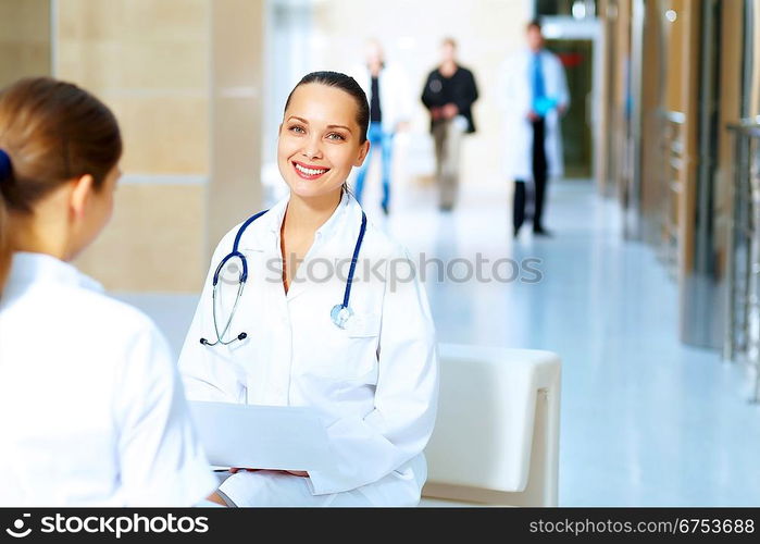 Portrait of two friendly female doctors