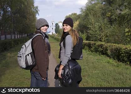 Portrait of two girl friends in park