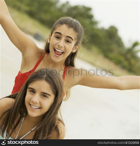Portrait of two girls laughing