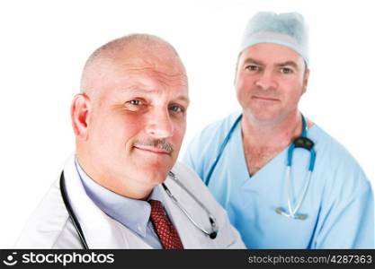 Portrait of two handsome doctors, one a mature physician and another young surgeon.