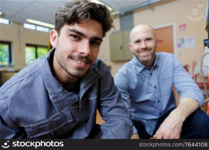 portrait of two male manual workers