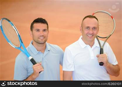 Portrait of two male tennis players