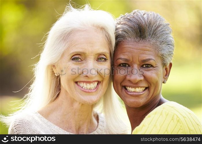 Portrait Of Two Mature Female Friends Hugging