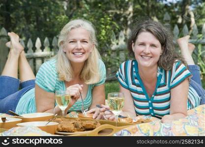Portrait of two mature women having lunch
