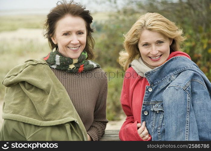 Portrait of two mature women smiling