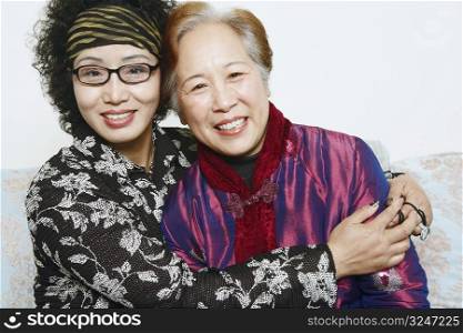 Portrait of two mature women smiling