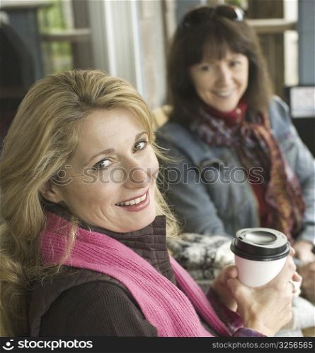 Portrait of two mature women smiling
