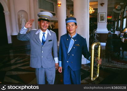 Portrait of two mid adult men smiling