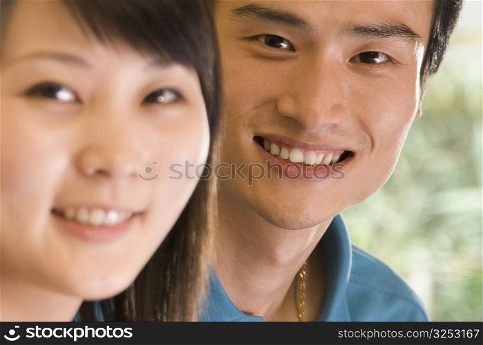 Portrait of two office workers smiling