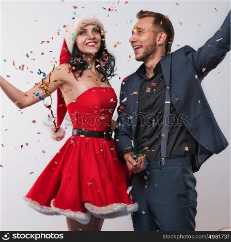 Portrait of two people man and woman in love celebrating new year eve or christmas party