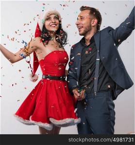 Portrait of two people man and woman in love celebrating new year eve or christmas party