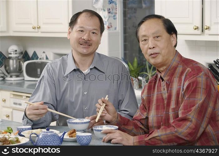 Portrait of two senior men at the table
