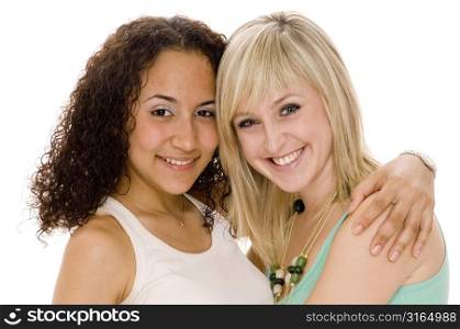 Portrait of two teenage girls hugging each other