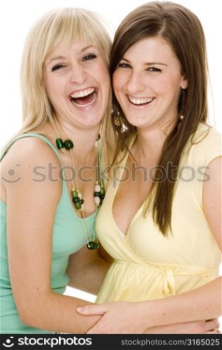Portrait of two teenage girls laughing