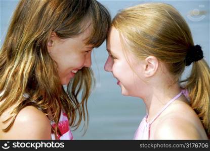 Portrait of two young happy girls