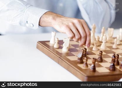 Portrait of two young man playing chess . Portrait of two young man playing chess in office