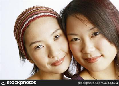 Portrait of two young women posing