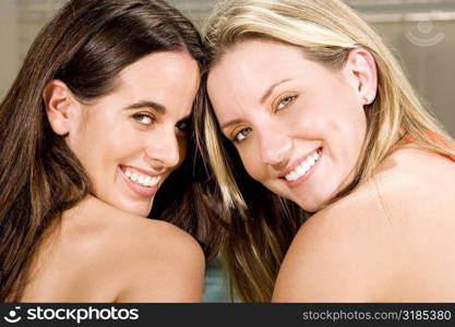 Portrait of two young women smiling