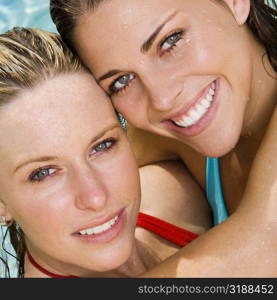 Portrait of two young women smiling