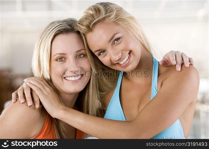 Portrait of two young women smiling