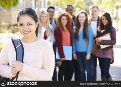 Portrait Of University Students Outdoors On Campus