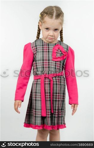Portrait of upset four-year girl. Half-length portrait upset and unhappy four-year girl Europeans